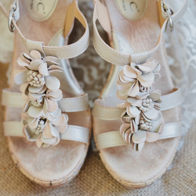 Claire walked down the aisle in a pair of champagne colored wedge ...