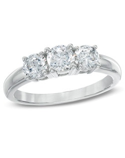 ... diamonds, this ring is finished with a polished shine. This ring